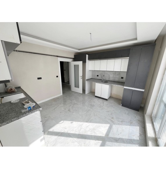 OVACIK'TA SIFIR DAİRE E.BANYOLU GİRİNME ODALI 4+1 LÜKS KİRALIK