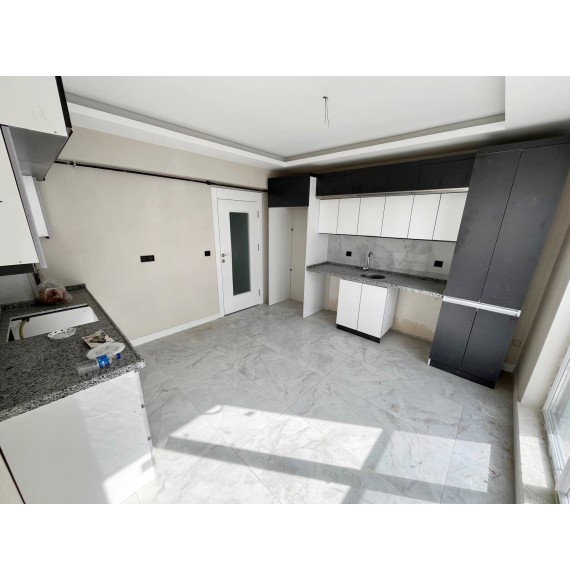 OVACIK'TA SIFIR DAİRE E.BANYOLU GİRİNME ODALI 4+1 LÜKS KİRALIK