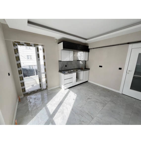 OVACIK'TA SIFIR DAİRE E.BANYOLU GİRİNME ODALI 4+1 LÜKS KİRALIK