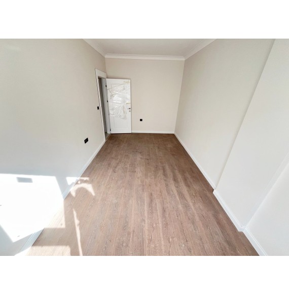 OVACIK'TA SIFIR DAİRE E.BANYOLU GİRİNME ODALI 4+1 LÜKS KİRALIK