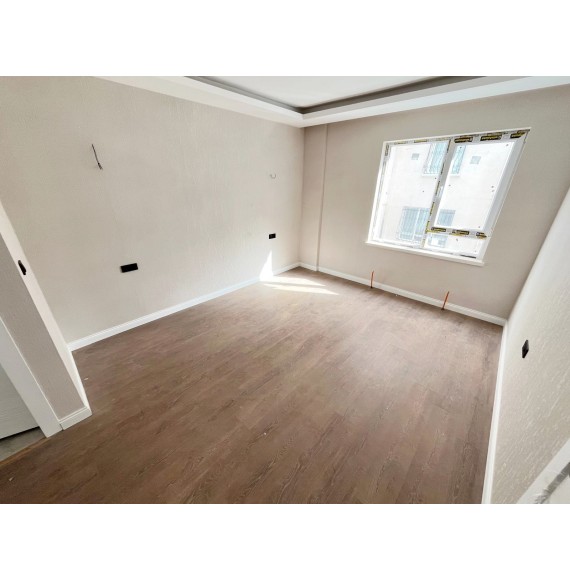 OVACIK'TA SIFIR DAİRE E.BANYOLU GİRİNME ODALI 4+1 LÜKS KİRALIK