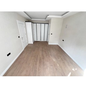 OVACIK'TA SIFIR DAİRE E.BANYOLU GİRİNME ODALI 4+1 LÜKS KİRALIK